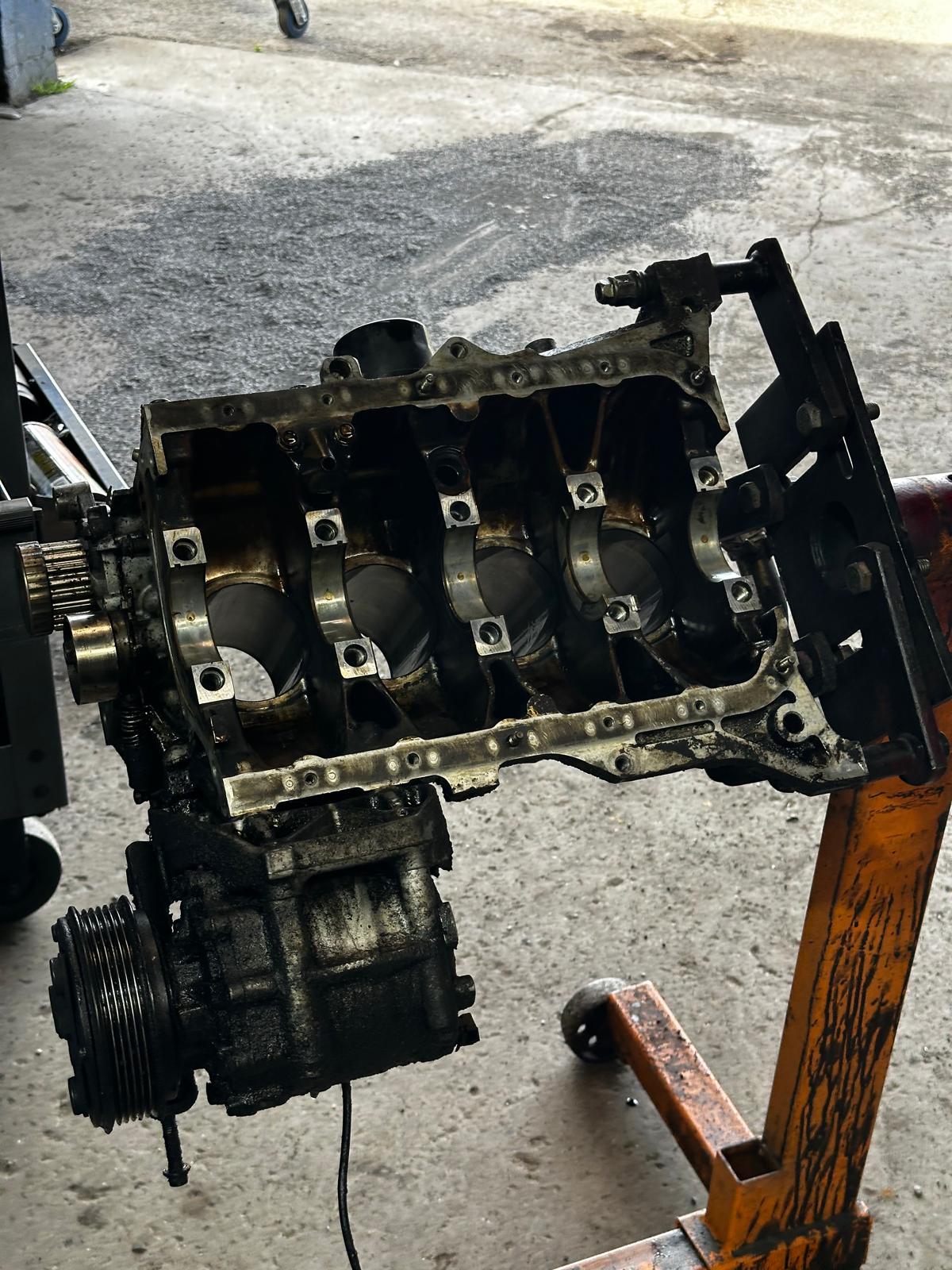 Engine block being rebuilt